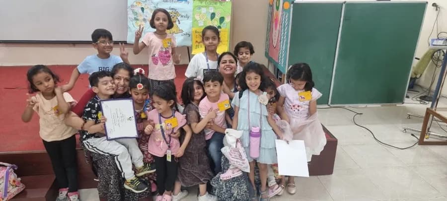 Young students celebrating their achievements in Supreet Kaur's life skills program in Delhi